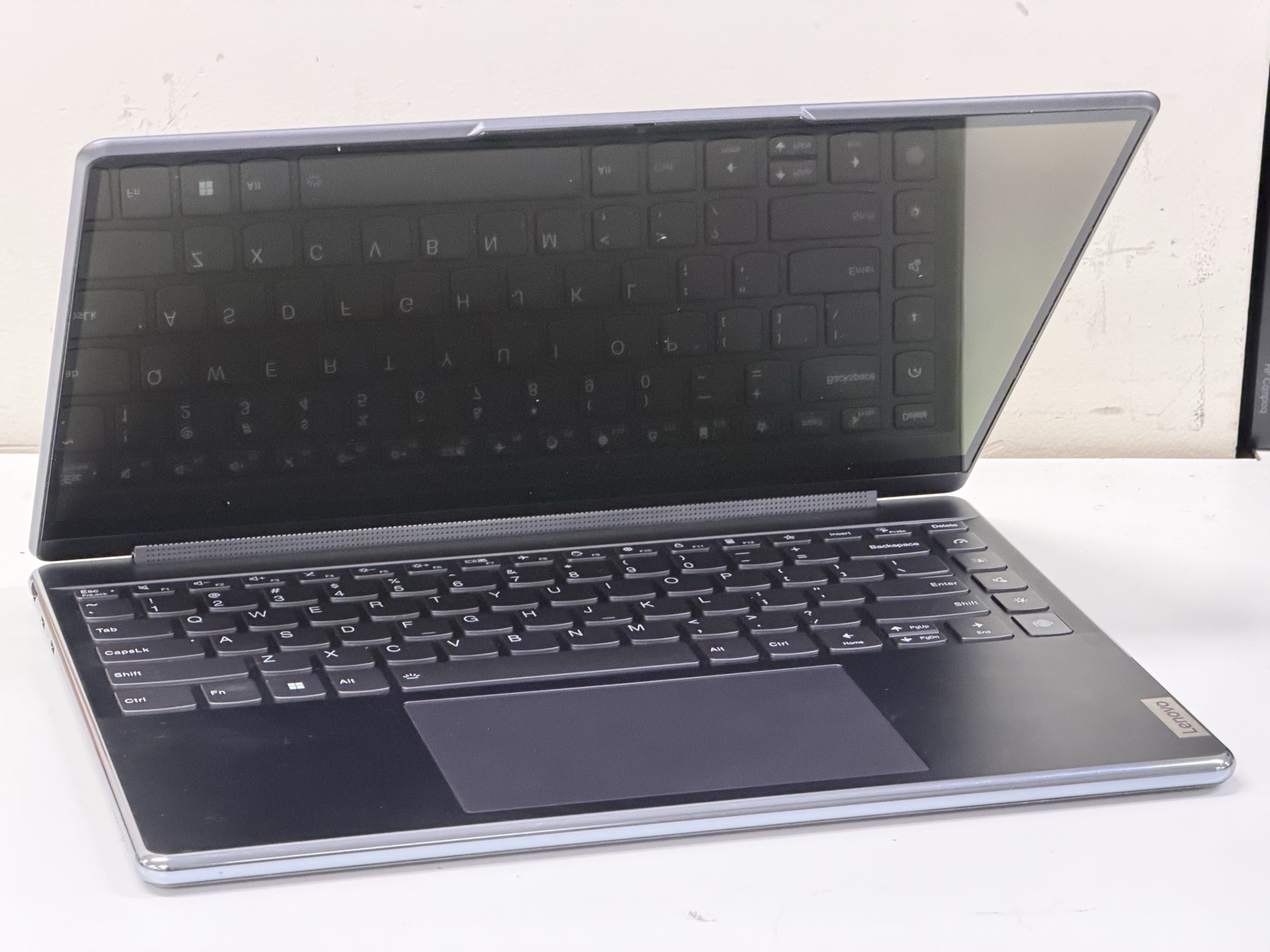 Lenovo Yoga 2-in-1 convertible laptop on the bench in our Perth workshop — used here to illustrate that we open, diagnose and repair every Lenovo line, including Yoga 360° hinges and touchscreen digitisers.
